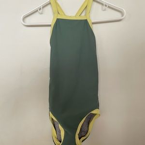 green and yellow crossed back leotard